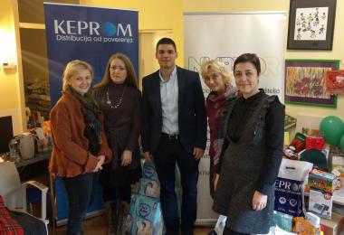 Keprom presents a donation to NURDOR