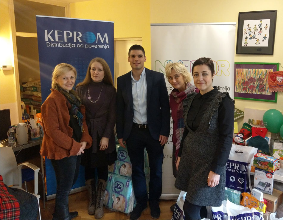 Keprom presents a donation to NURDOR